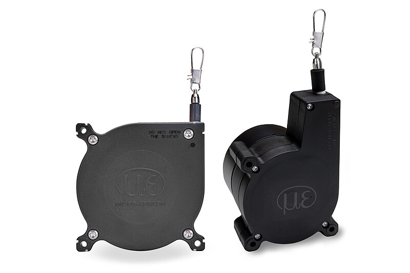 Draw-wire sensor mechanics with plastic housing