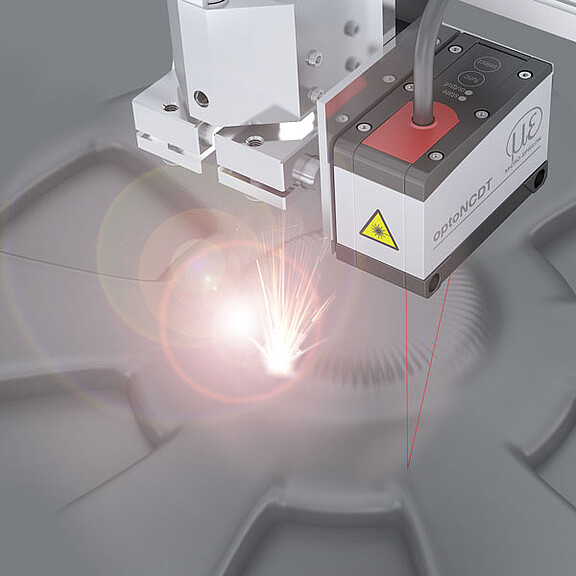 Laser sensors with maximum ambient light compensation